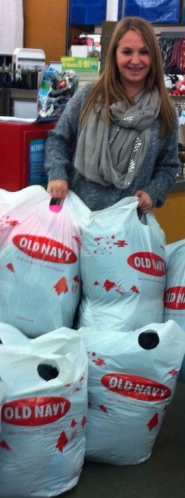 Rachel buying coats at Old Navy for the One Warm Coat Drive