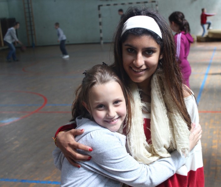 Sahar and a young Bosnian girl (Photo courtesy of Sahar Afrakhan)
